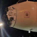 Damaged plane makes emergency landing after encountering severe weather